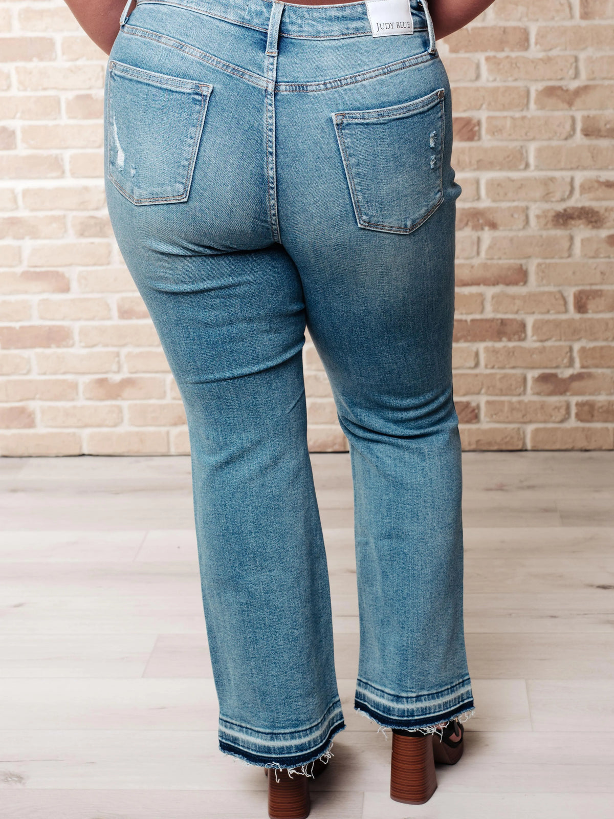 Judy Blue Raw and Reckless Ditressed Bootcut Mid Rise Jeans-Women's Jeans-Shop Z & Joxa